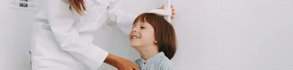 Botón que lleva a crecimiento infantil deficiente